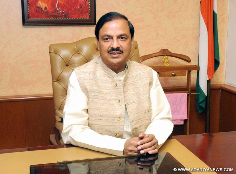 En news 04161876 Dr. Mahesh Sharma taking charge as the