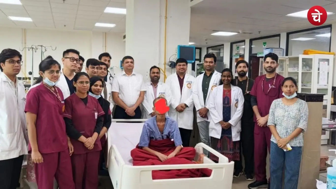 A 16-year-old boy sitting with the team of doctors after a successful surgery at AIIMS Raebareli