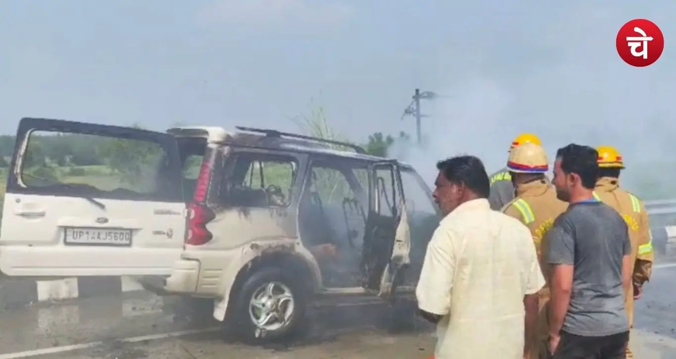 A Scorpio car engulfed in flames on the Nagina-Dhampur bypass.