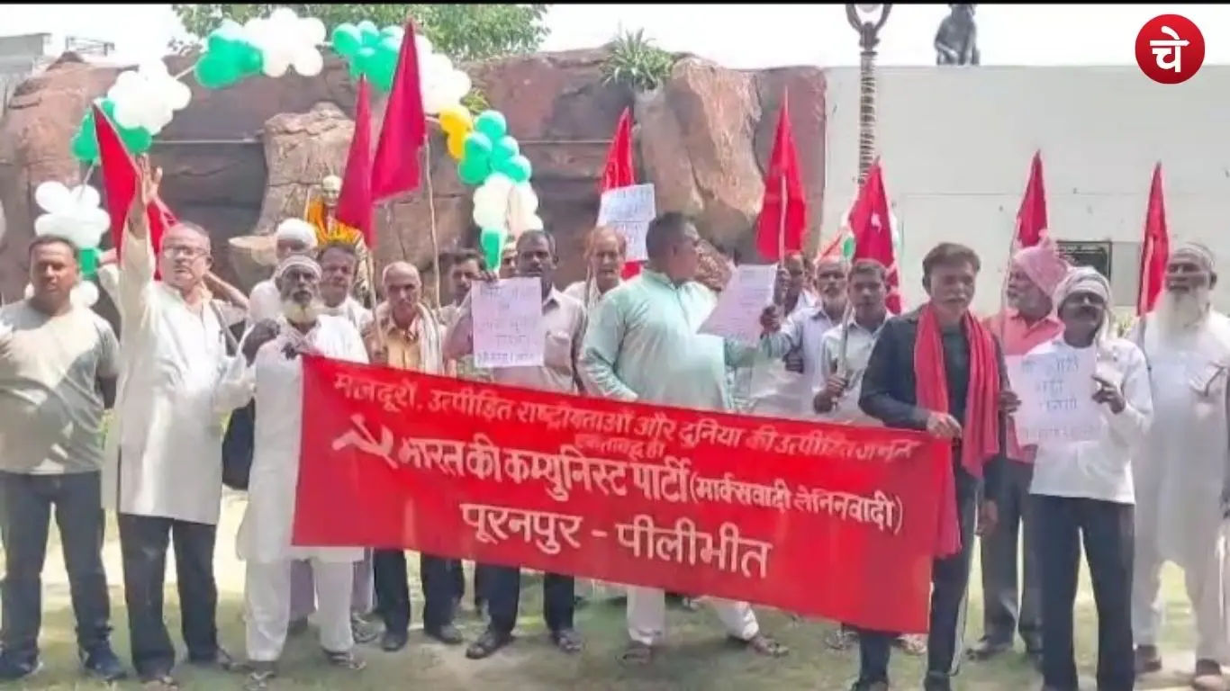 CPI(ML) activists took out a 'Save Democracy' march in Puranpur on Gandhi Jayanti