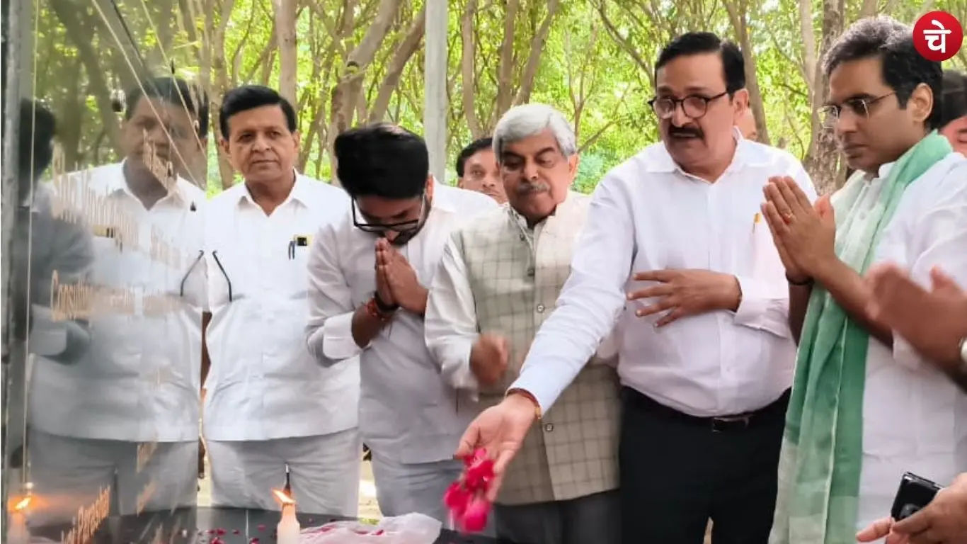 Noida MLA Pankaj Singh, Chetna Manch Editor R.P. Raghuvanshi, and other journalists paying floral tributes at the memorial built in memory of deceased journalists at Smriti Van in Sector 73