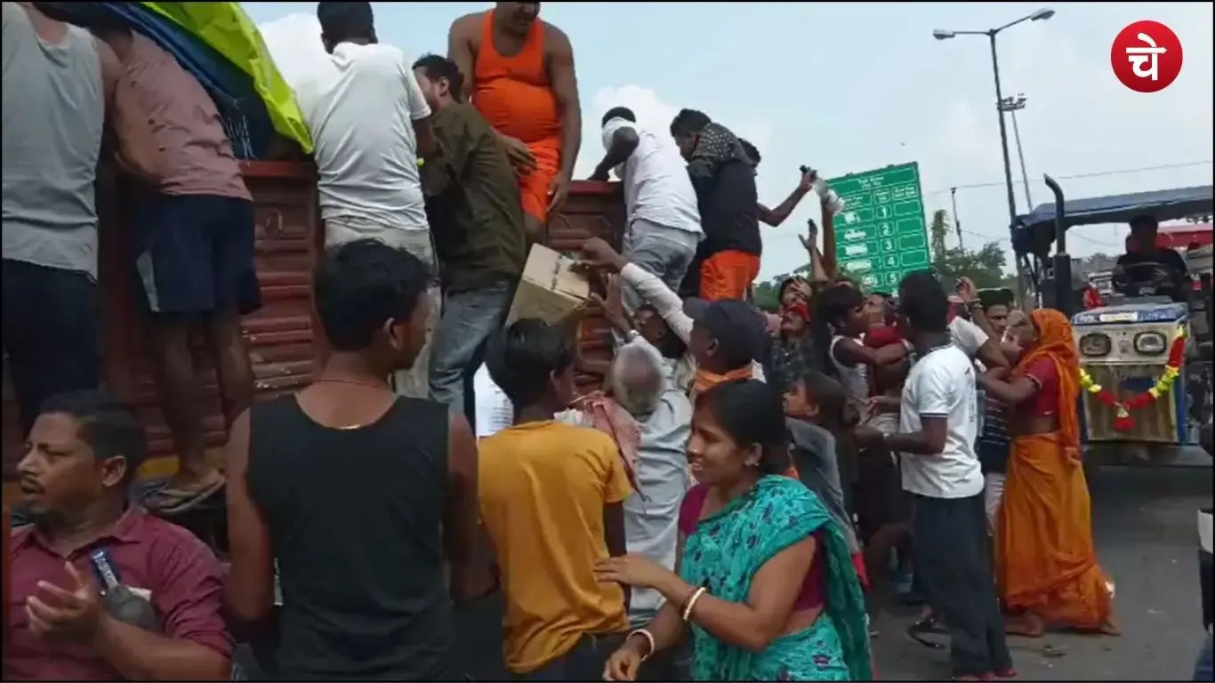 People looting a truck loaded with liquor after it overturned