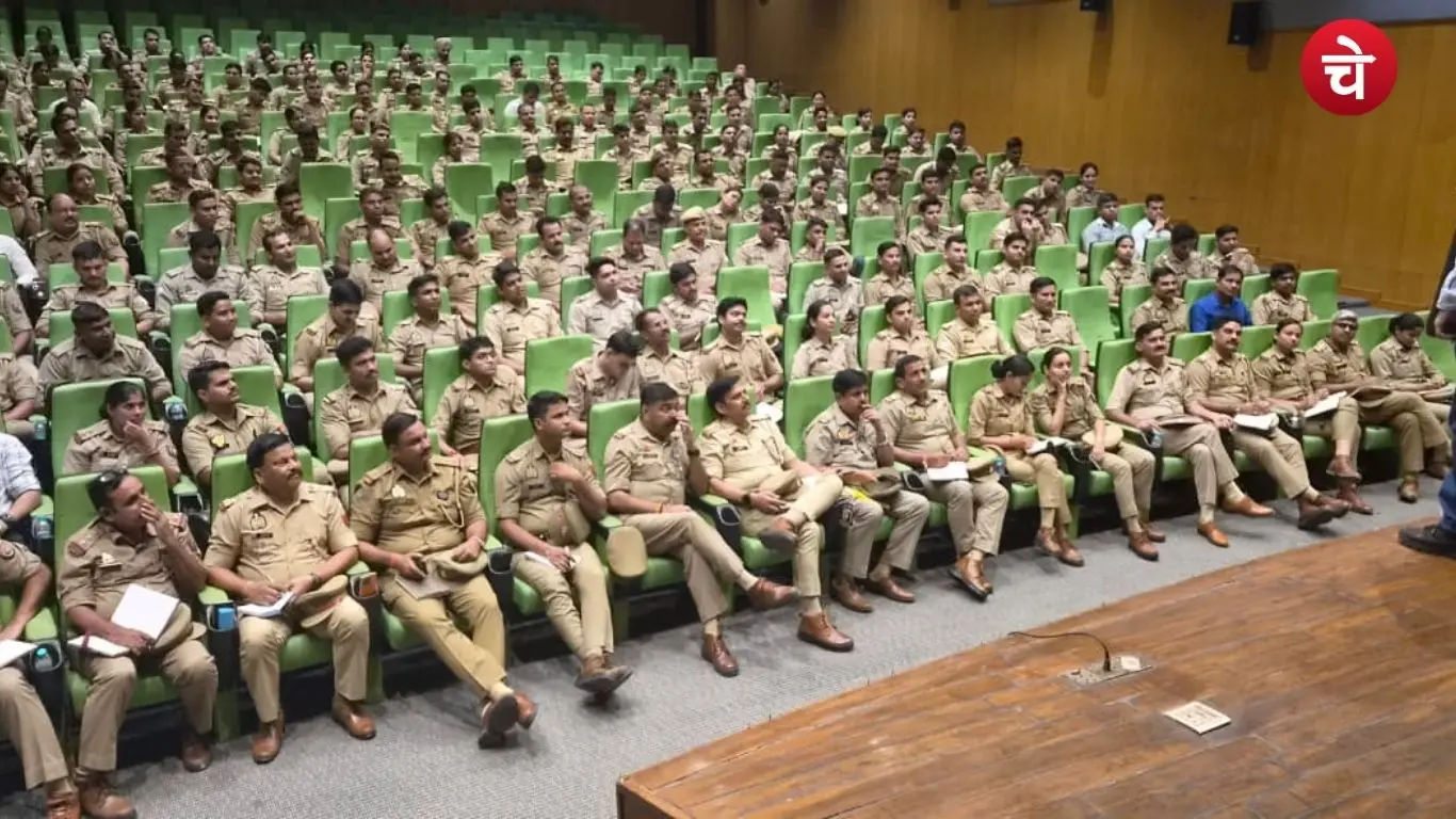 Photographs of police personnel and officers of the Noida Police Commissionerate participating in a program held at the Commissionerate's auditorium on Monday