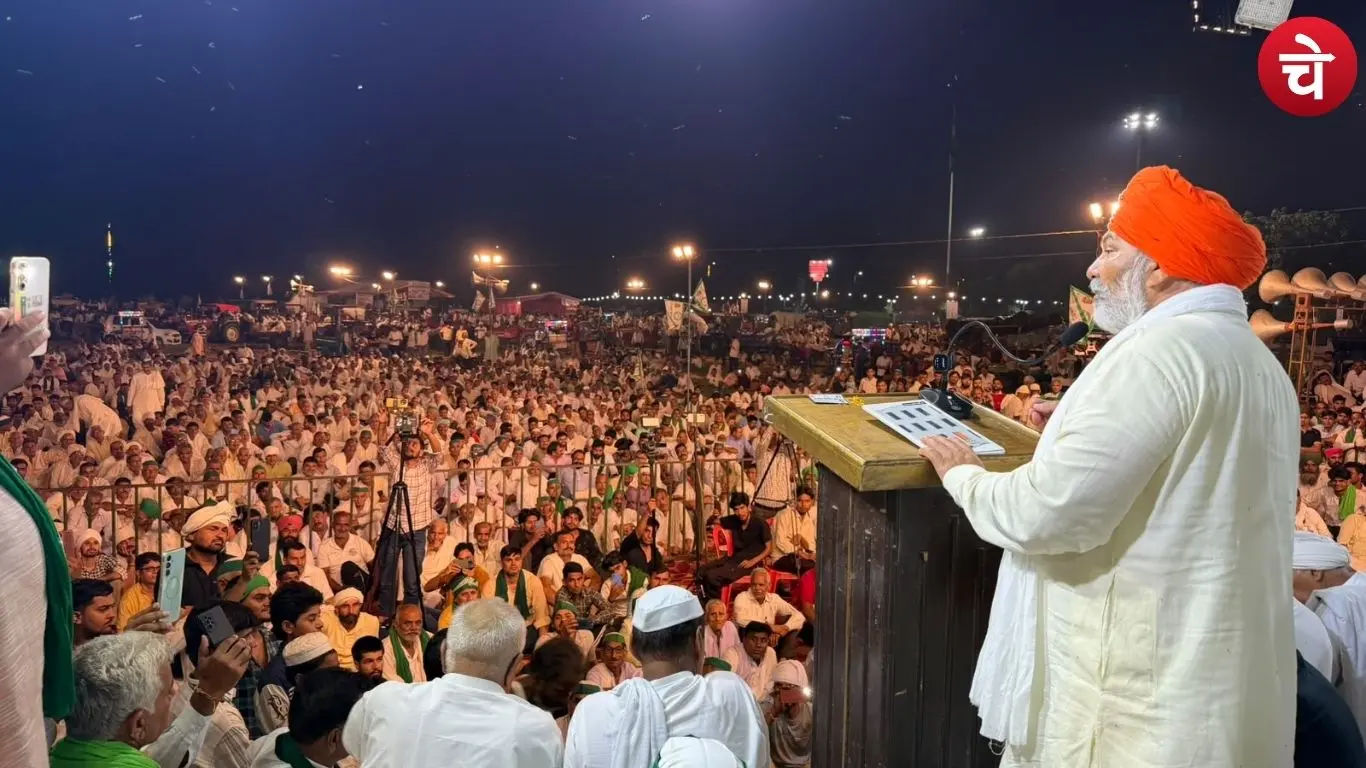 A photo of BKU leader Rakesh Tikait addressing a farmers Mahapanchayat' at night in Muzaffarnagar