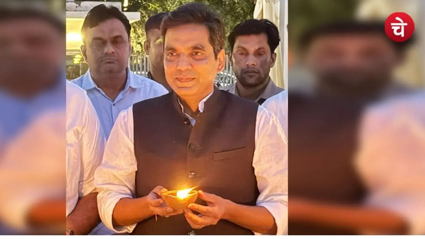 A photo of Noida MLA Pankaj Singh lighting a lamp during the Aashirwad ka Diya event in Noida on Prime Minister Narendra Modi birthday