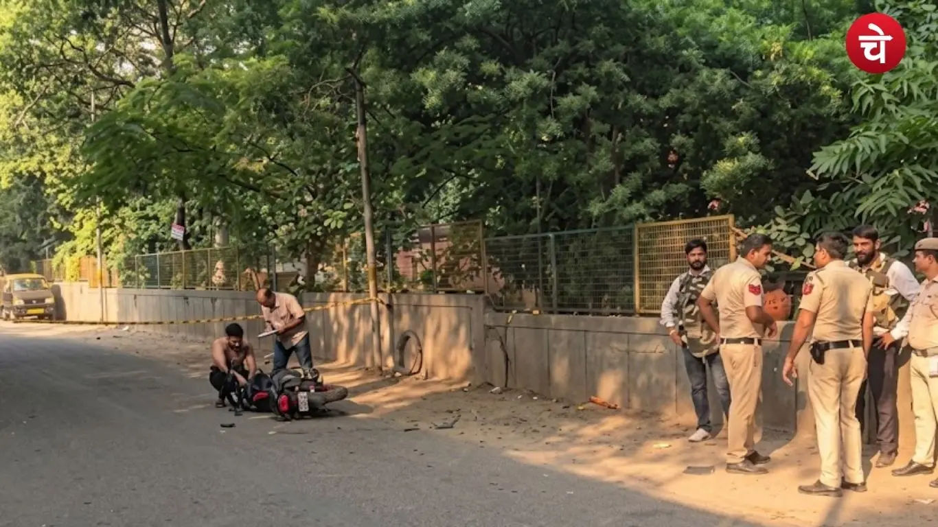 Delhi Police team inspecting a motorcycle at the scene following the encounter (1)