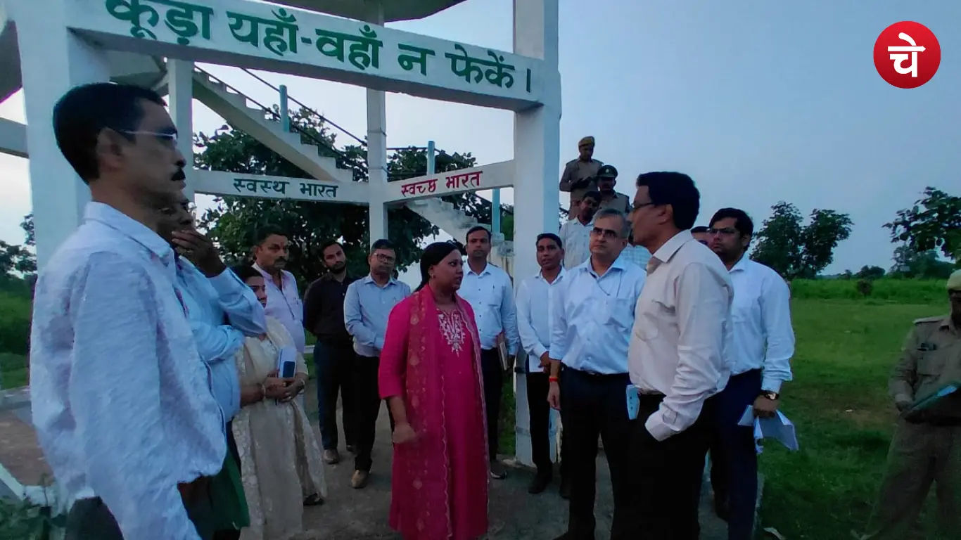 Divisional Commissioner Dr. Lokesh M.'s file during inspection