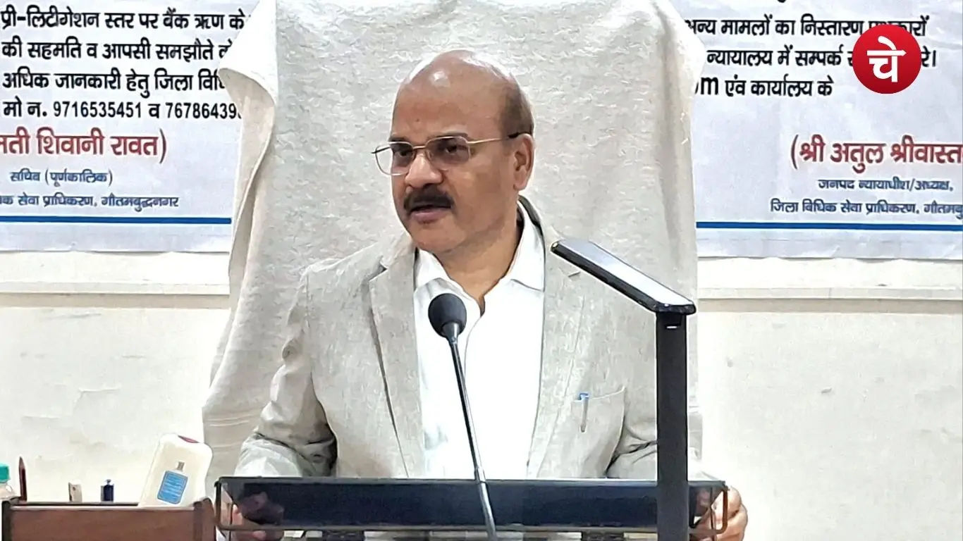 Gautam Buddha Nagar District Judge Atul Srivastava addressing a press conference at the district court complex in Greater Noida