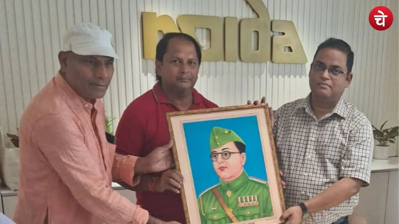 Office bearers of Gram Vikas Sangathan Noida felicitating Krishna Karunesh CEO of the Noida Authority