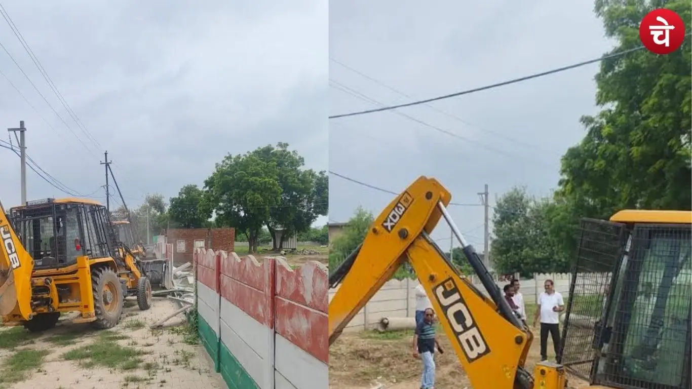 Officials and employees of the Greater Noida Authority are not visible in this photo showing the removal of encroachments via bulldozer; however, we are providing you with a photo of the bulldozer