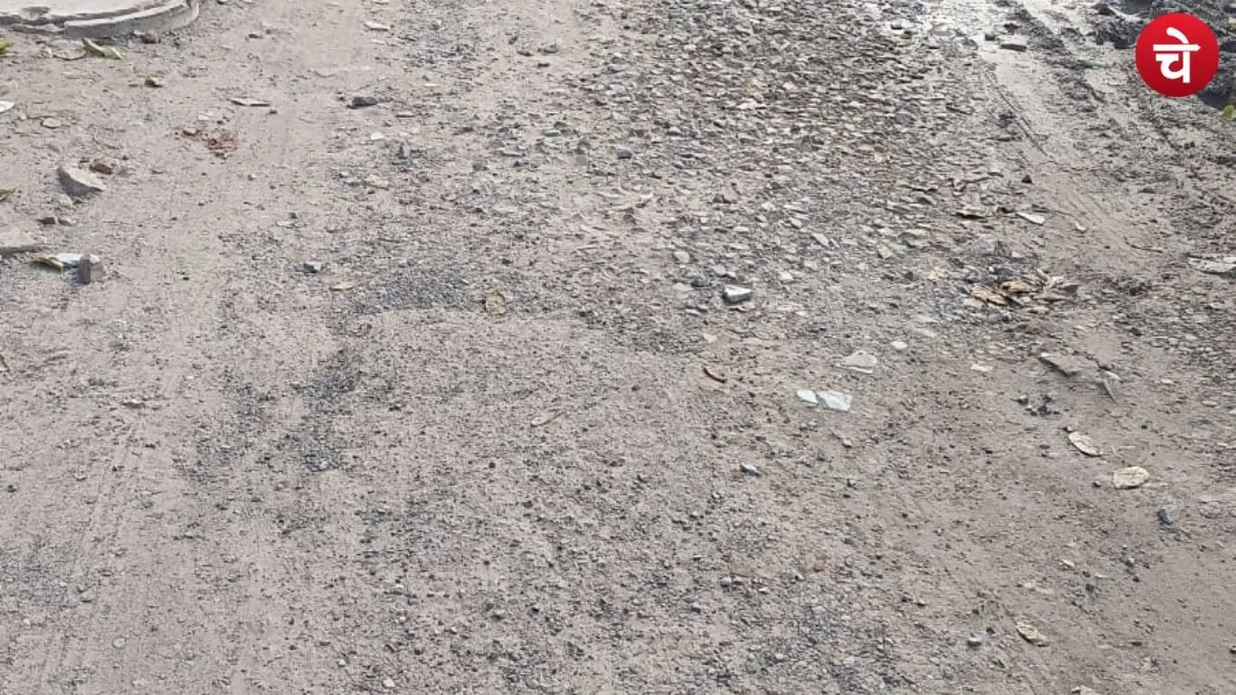 Photo of a damaged road in Noida Sector-130
