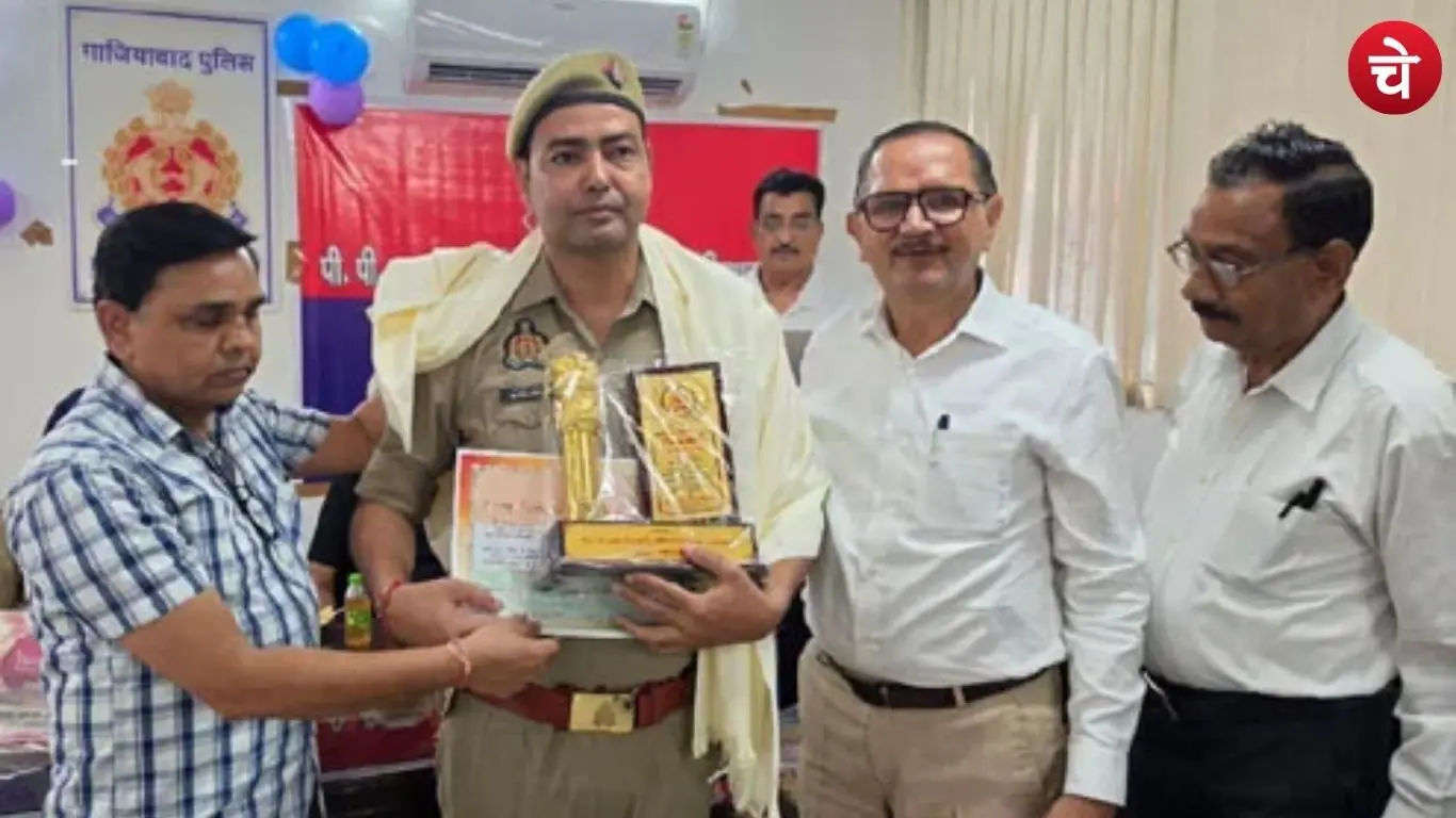 Photo of a police officer from the Uttar Pradesh Police team being honored