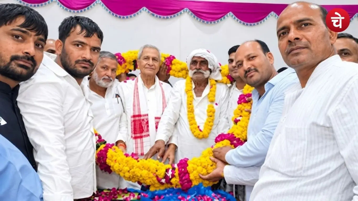 Supporters welcoming Minister Lakshmi Narayan Chaudhary after the budget for restarting the sugar mill was passed