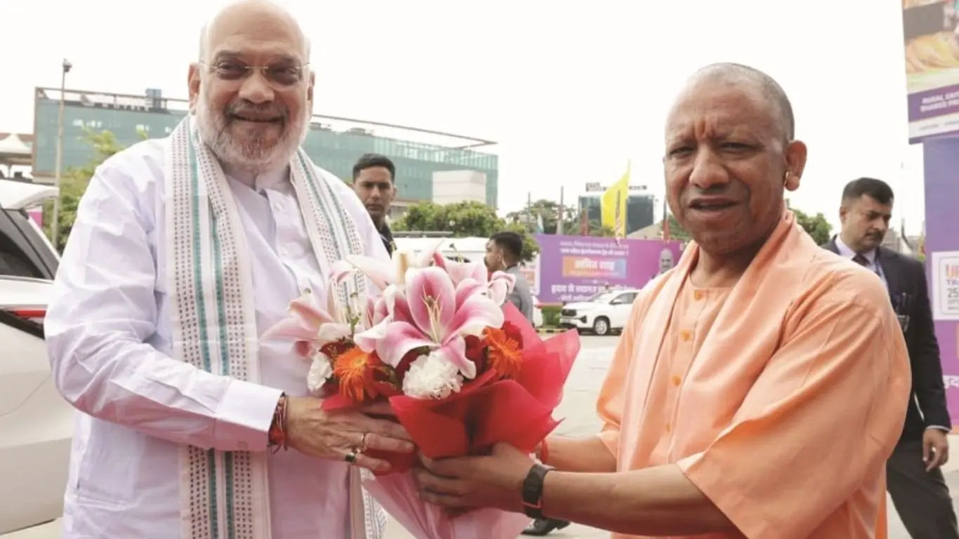Uttar Pradesh Chief Minister Yogi Adityanath welcoming Union Home Minister Amit Shah at UPITS 2026 in Greater Noida